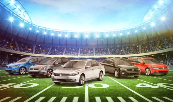 A custom-made image of five popular VW models on a football field inside of a stadium
