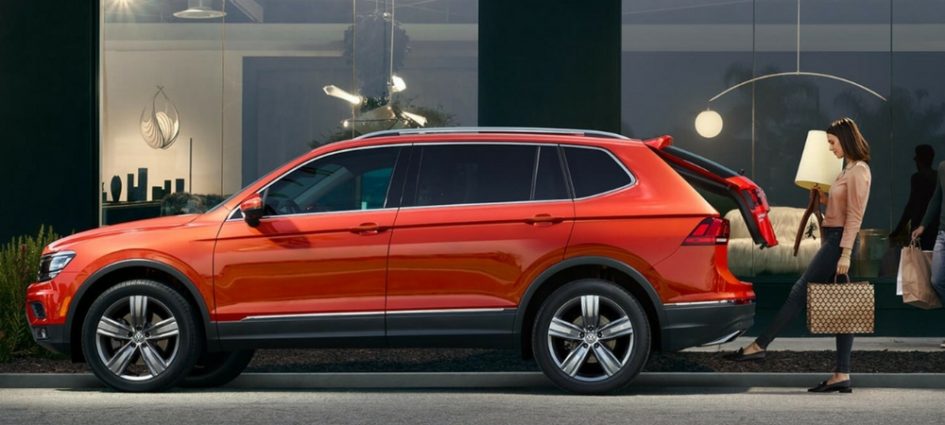 A side view of a red 2018 Volkswagen Tiguan